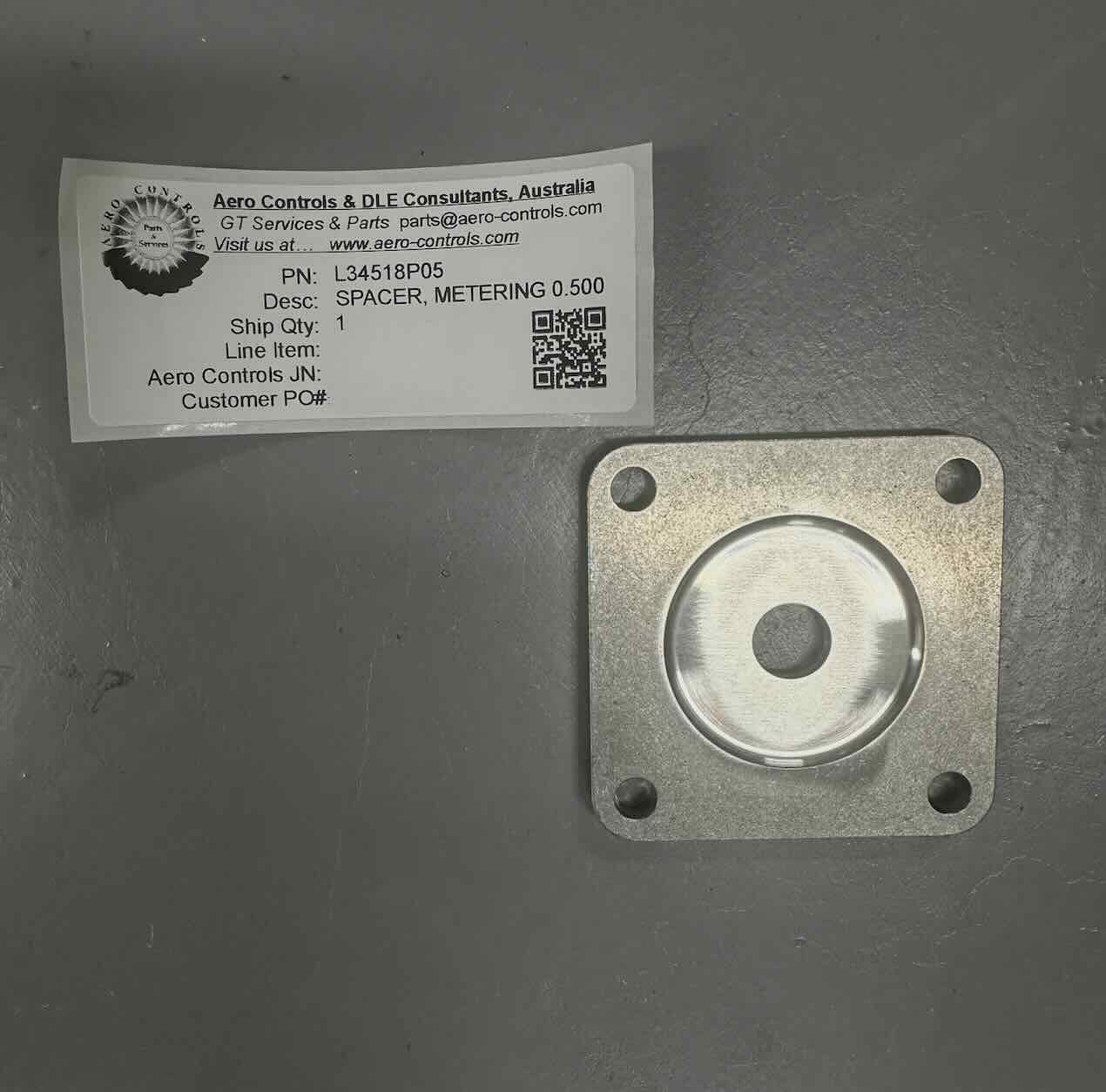 L34518P05 SPACER, METERING, 0.500 ORIFICE DIAMETER